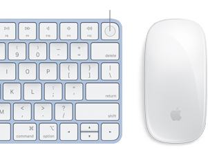 Nahaufnahme von Magic Keyboard und Magic Mouse in passenden Farben mit Fokus auf dem Touch ID Fingerabdruck